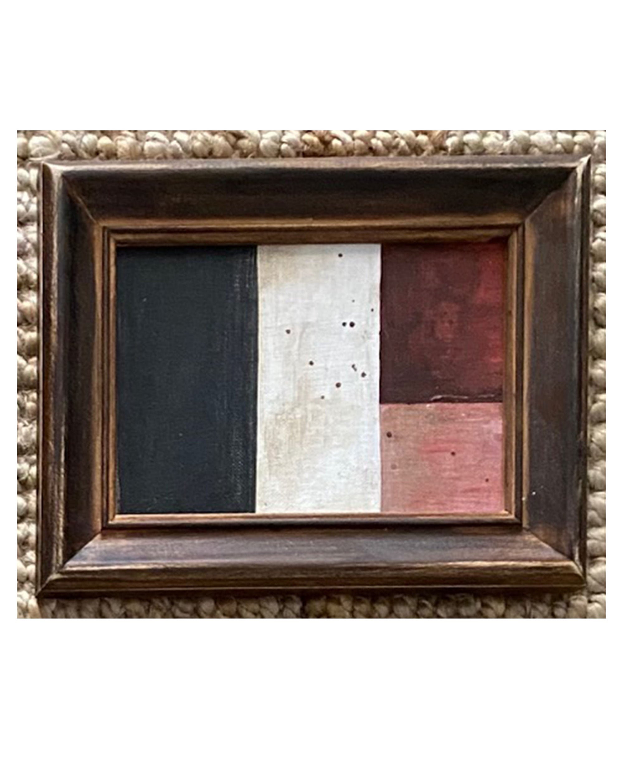 The STRIPES Framed Art by Tak Design features four blocks of black, white, dark red, and pale pink on a textured neutral background. Hand painted by a local artist, it adds a unique touch to any space.