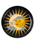 The Sun and Moon Tray by Indaba is a decorative enameled catchall featuring artistic yellow sun and pale crescent moon faces, blue clouds, and orange rays on a dark background—perfect for adding charm to any space.