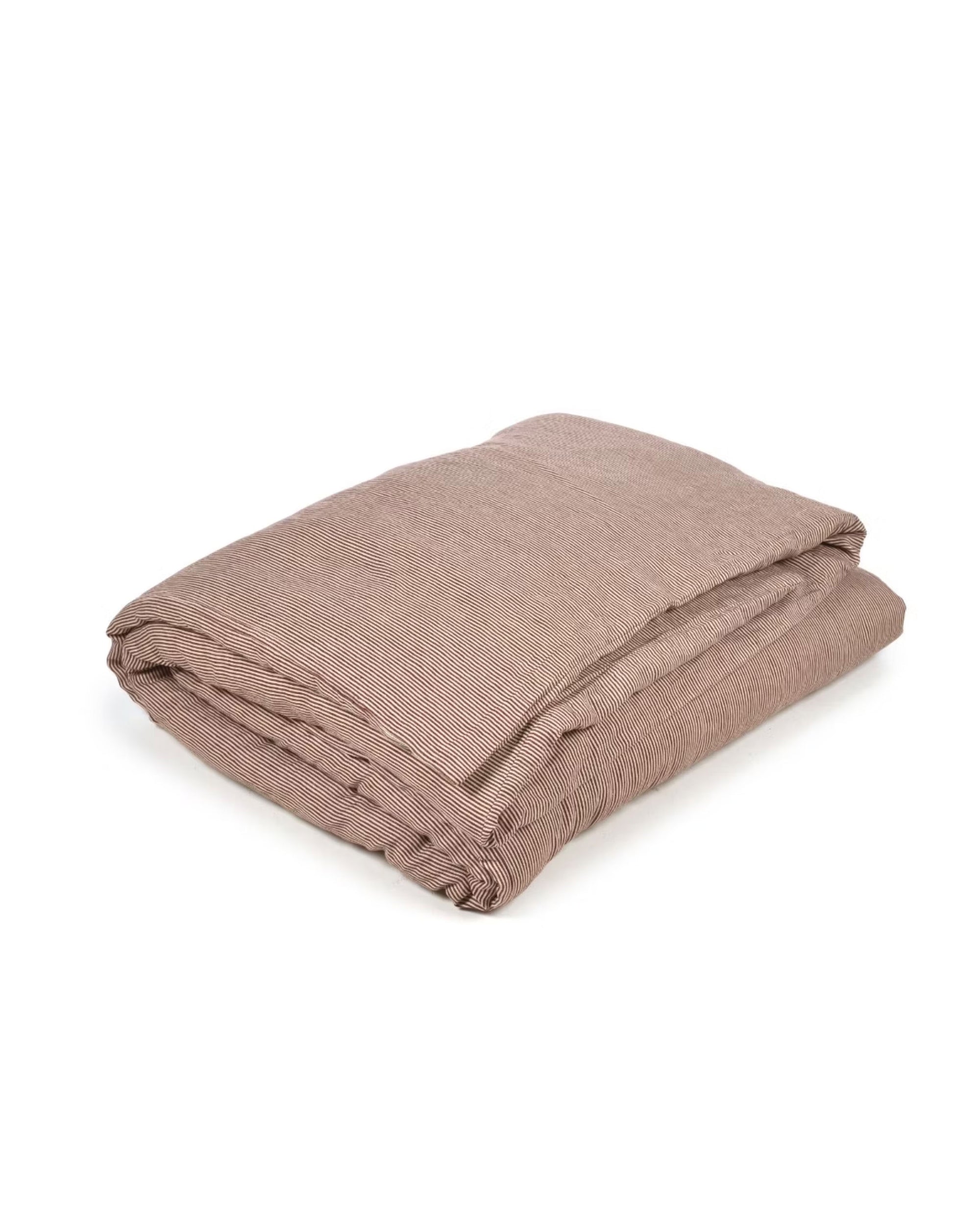 The Swimmer Stripe Super King blanket by Libeco Home features a subtle textured pattern and washed finish in light brown, shown folded on a white background.