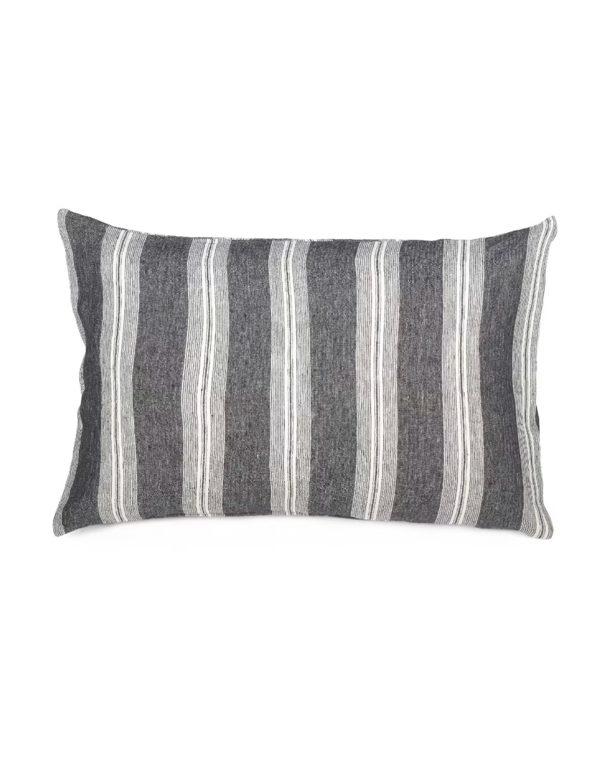 The Libeco Home Tahoe Stripe Super King is a rectangular decorative pillow made from pure linen, featuring dark gray and white vertical stripes with a soft washed finish, shown against a white background.