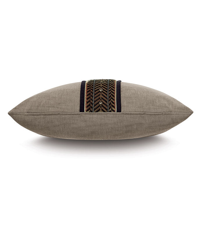 The Eastern Accents TAI-10 TALENA NAILHEADS pillow, beige and rectangular with textured fabric and a central black and brown chevron border, is displayed side view on a white background.