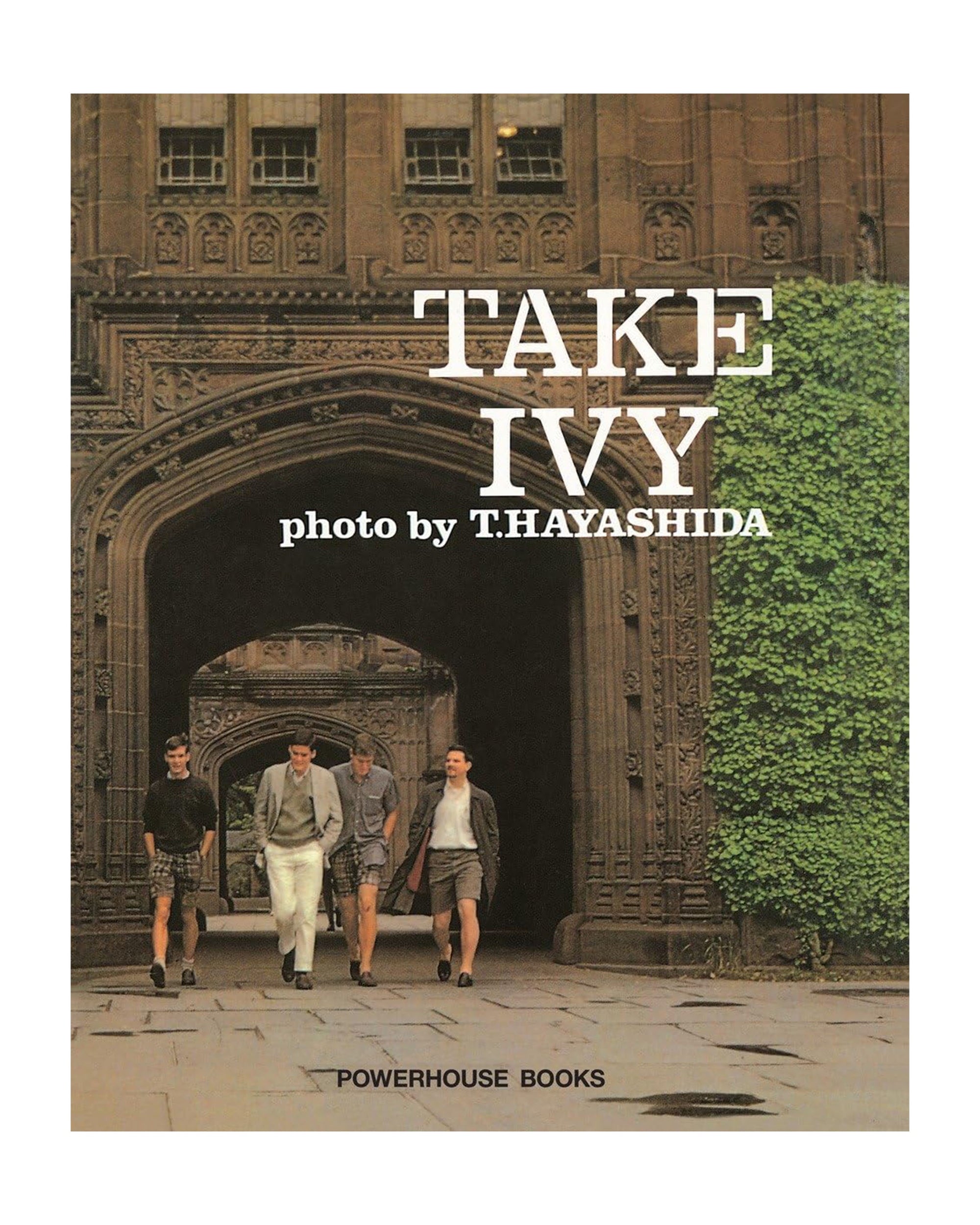 Four young men in Ivy League style stroll through an ivy-covered stone arch. Text reads, “Take Ivy by Simon & Schuster Inc.”.