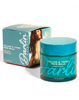 A teal jar of Faire Tallow Face Balm Moisturizer sits before its matching box, which features a woman's photo and product info. Made with grass-fed tallow, this daily moisturizer is ideal for acne-prone skin.