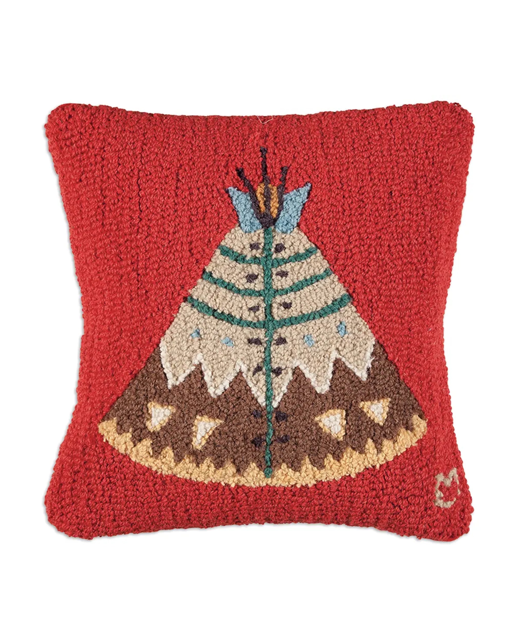 The C4C Teepee 2 Pillow by Faire is a square red hand-hooked pillow crafted from natural wool, featuring a colorful stylized teepee design with blue, green, brown, and cream accents for a cozy Vermont vibe.