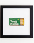 A book of green "Tennis matches" matches with some sticks visible is displayed in an Art Square Black Frame artwork on a white background by Match South.