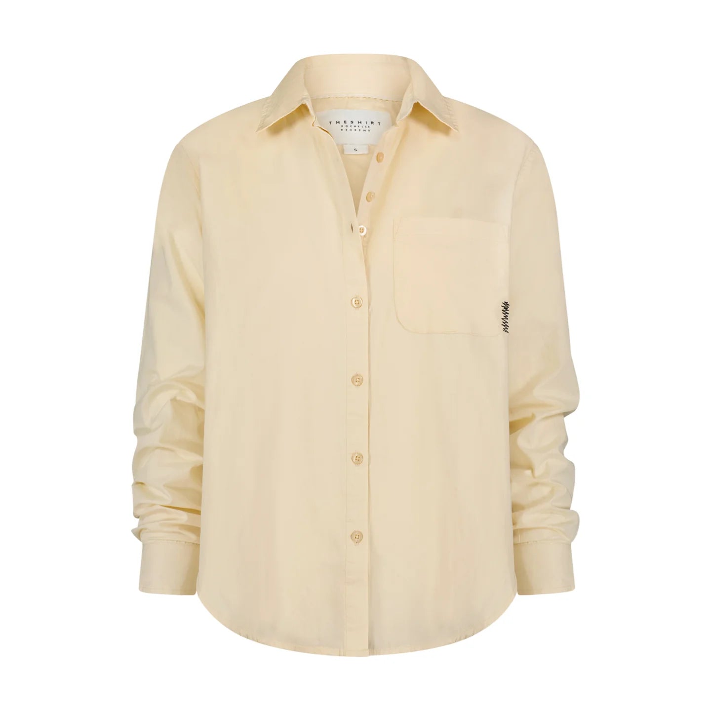 The Super Relaxed Boyfriend by THE SHIRT is a light beige cotton poplin shirt with a collar, single chest pocket with subtle stitching, No Gape button technology, and slightly wrinkled long sleeves in a relaxed fit.