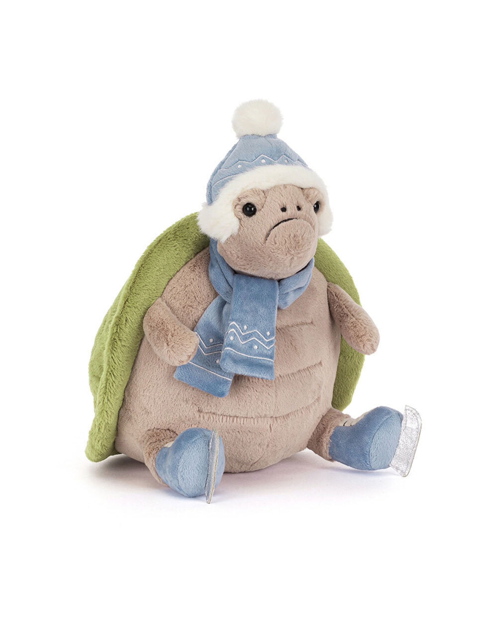 Meet Timmy Turtle Skating from Jelly Cat Inc.—a plush turtle with a green shell, blue winter hat and scarf, plus blue shoes with silver skate blades. Sitting upright and facing forward, Timmy makes a charming festive ice-skating gift!.