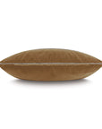 The TAOS FAUX MOHAIR pillow by Eastern Accents is shown from the side, highlighting its soft brown texture and thin, light-colored piping along the seam.