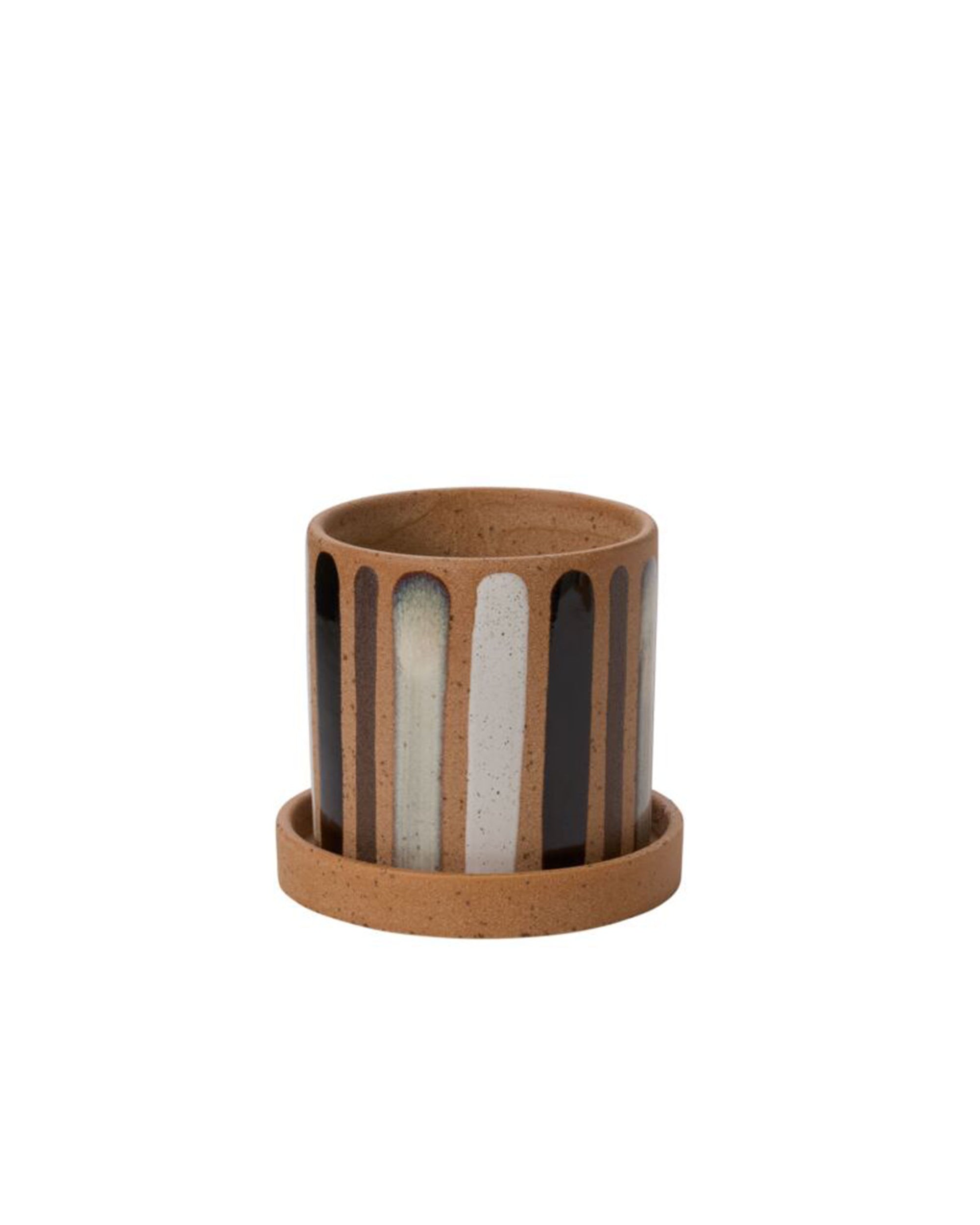 The Truman Pot/Saucer 6x5.5" by Accent Decor is a small, cylindrical ceramic pot with a matching saucer, featuring hand-painted vertical black, white, and gray drips over a natural brown base.