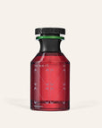 A red glass bottle with a black cap and green accent, labeled "The Nue Co" and "Pheremone Fragrance 50ml," showcases a modern, minimalist design. This musky scent stands on a light beige background.