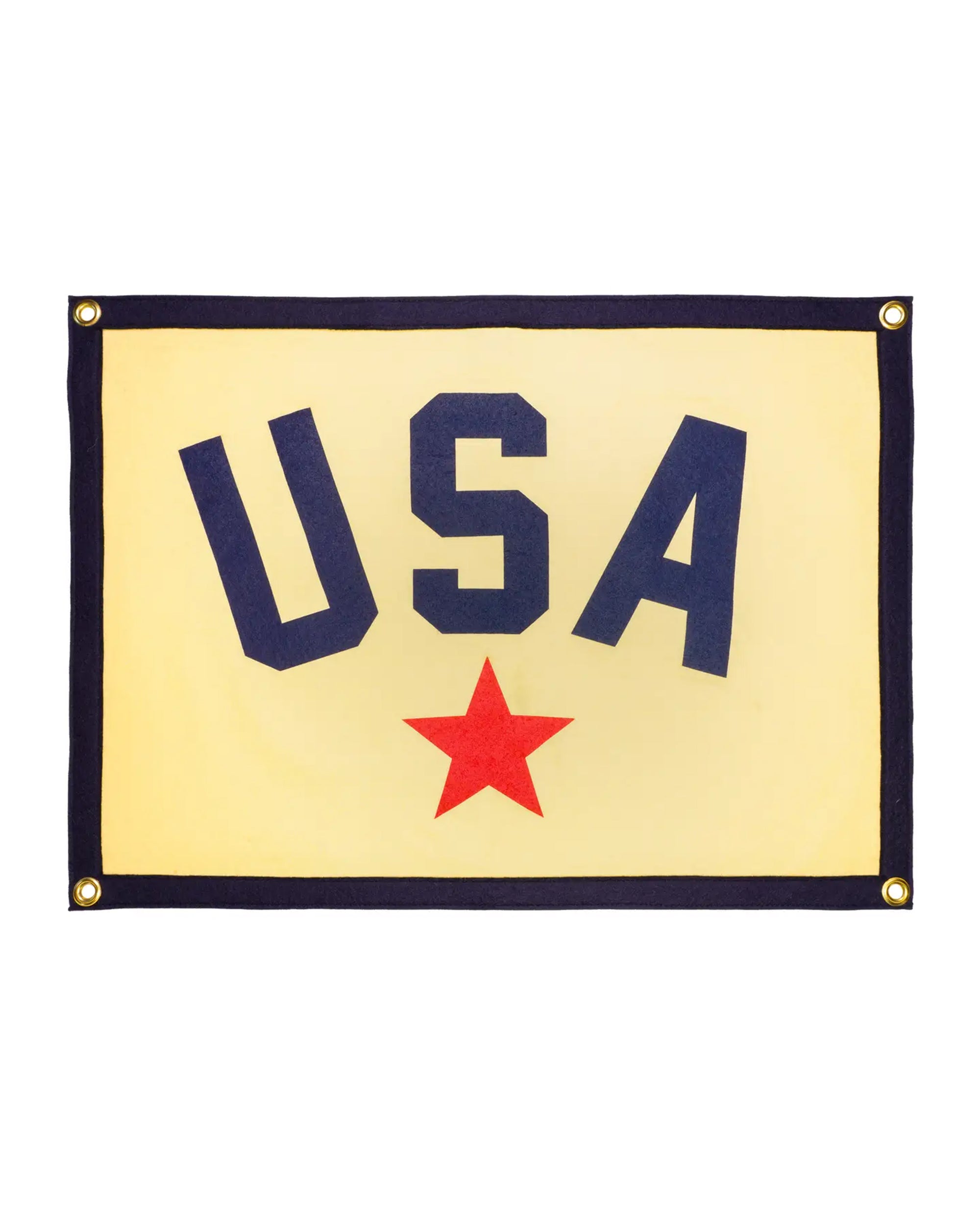 The Oxford Pennant USA Camp Flag 18x24 features a cream backdrop, navy border, bold navy "USA" lettering above a large red star, and gold grommets—ideal patriotic decor for any space.