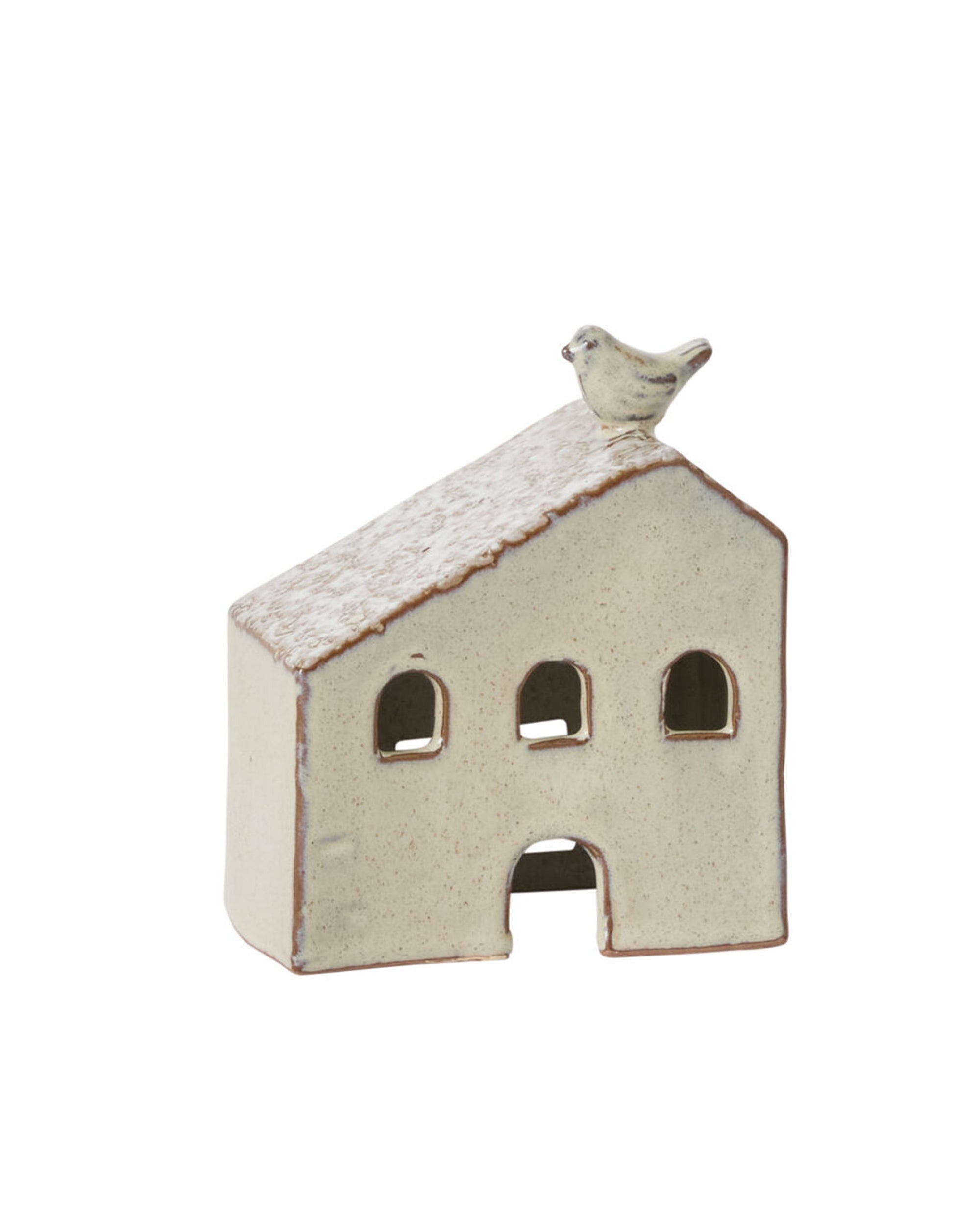 Accent Decor’s Village House is a small, cream ceramic home with three arched windows and a bird on its snowy roof—ideal for bringing festive charm to your winter wonderland or ceramic village houses collection.