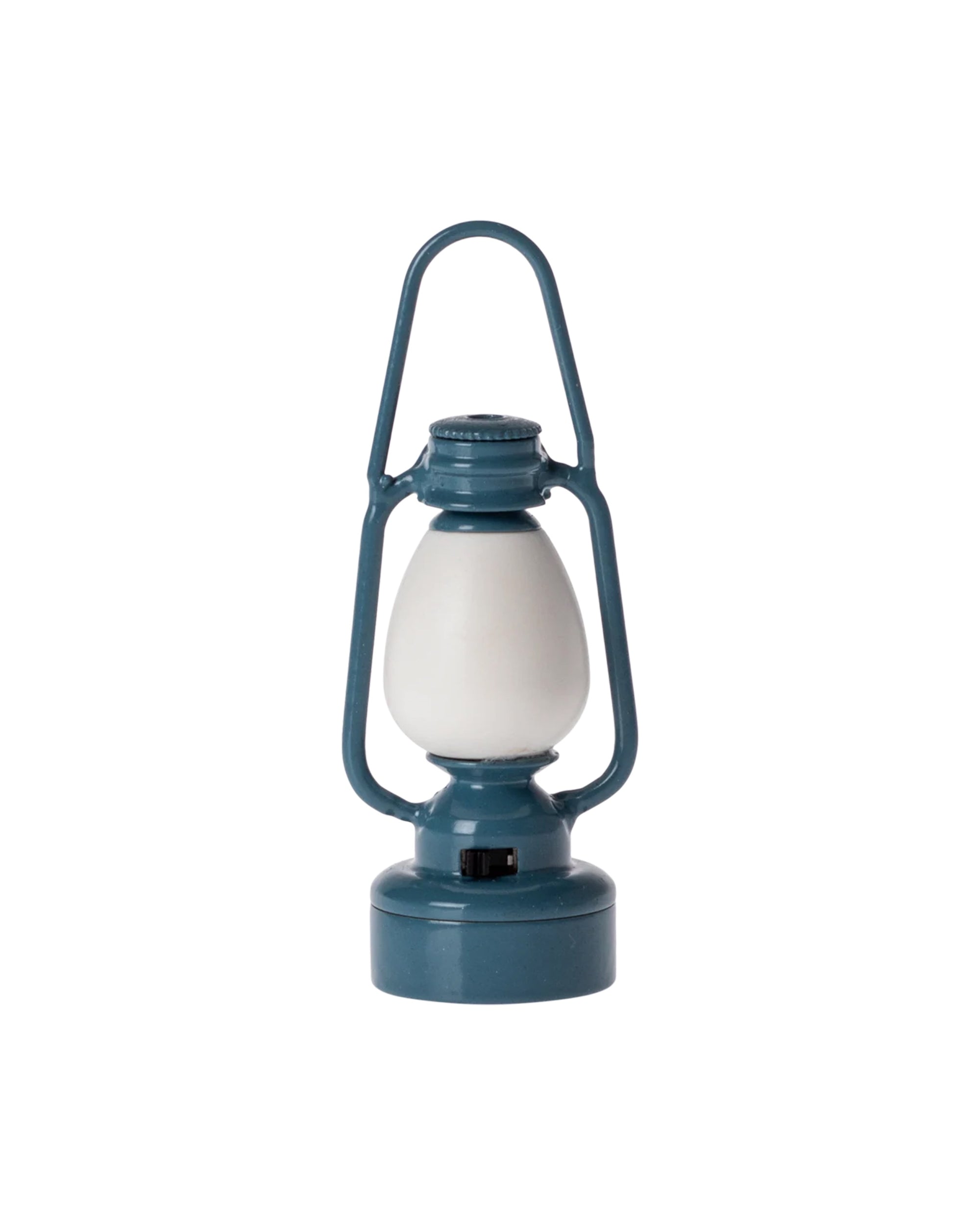 The Maileg Vintage Lantern by Maileg is a blue, vintage-style miniature lantern with a white glass center and a top handle for carrying, shown against a plain white background.