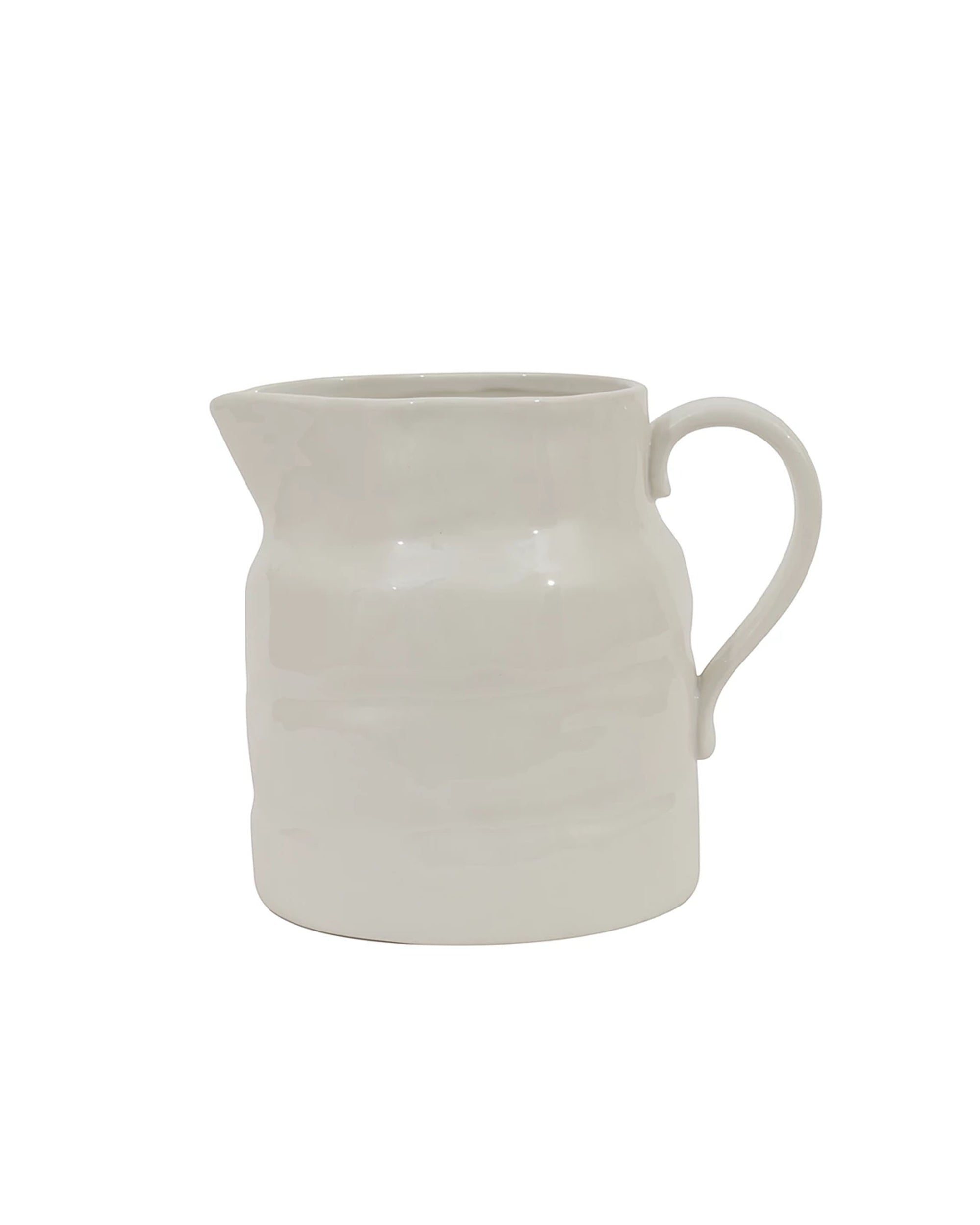 The Creative Co-op DA7220 White Stoneware Pitcher features a plain white finish, a curved handle, and a small spout, shown against a white background.
