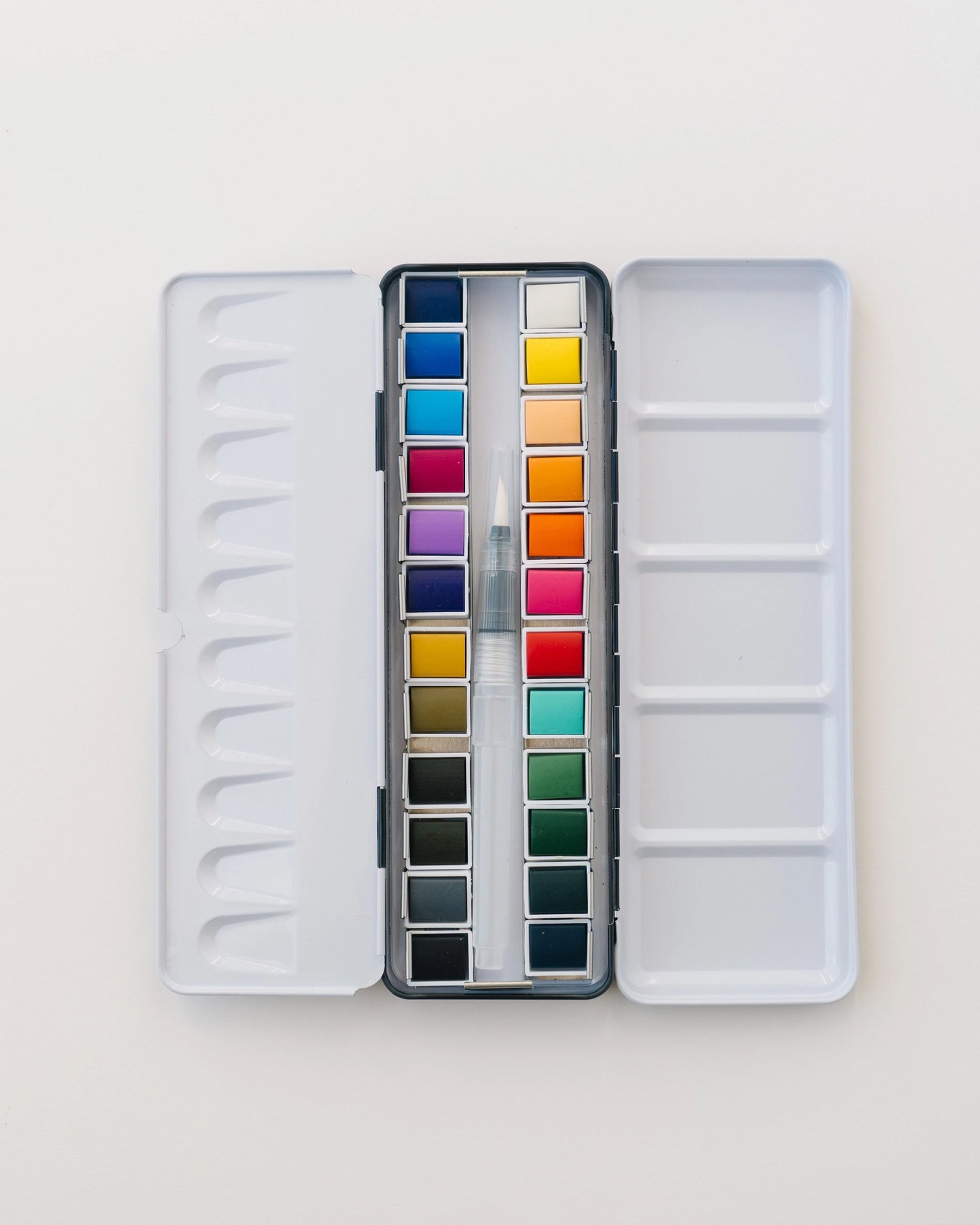 The Faire Watercolor Paint Palette is a portable set that includes a refillable water brush and paintbrush.