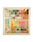The Watercolor Artist's Palette Glass Tray by Faire features a vintage grid of colorful paint swatches with handwritten labels—a perfect inspiration for artists or a decorative accent in any creative space.