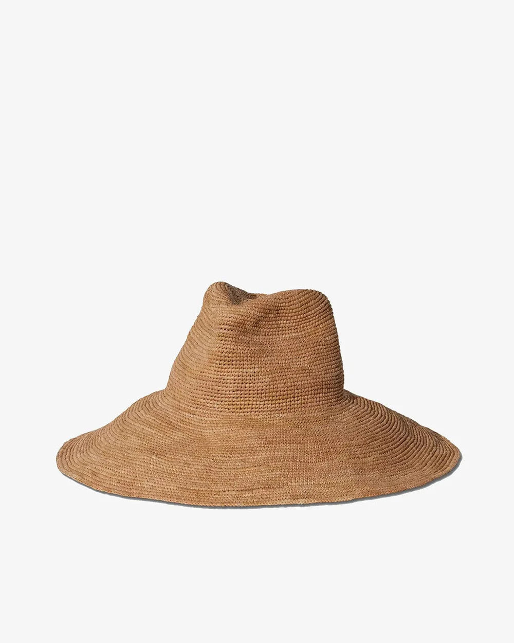 The Janessa Leone Waverly Sand is a light brown wide-brimmed raffia straw hat with a slightly tapered crown, shown against a plain white background.