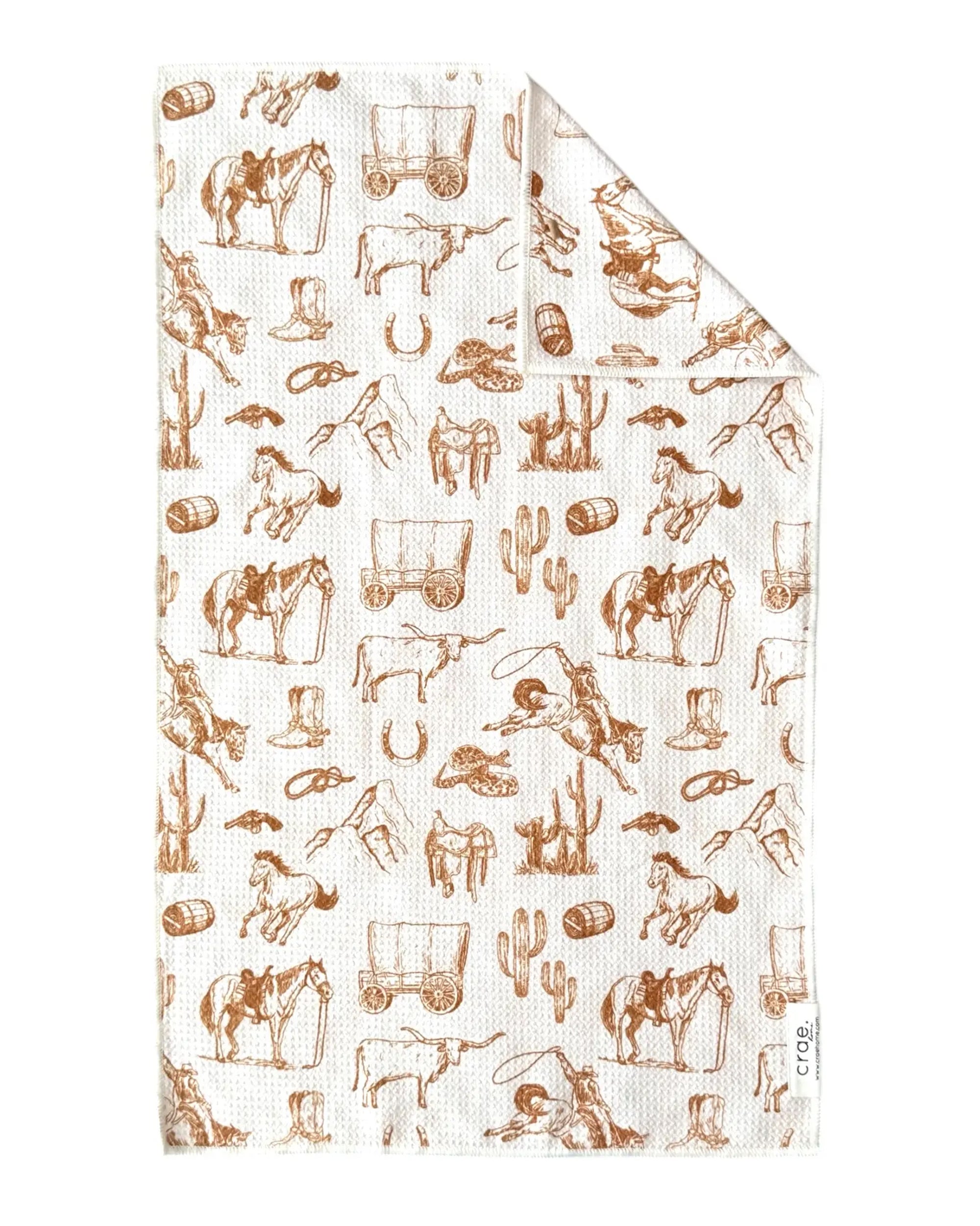 The Faire Western: Double-Sided Hand Towel is a white waffle weave microfiber towel with brown cowboy, horse, cactus, boot, and lasso motifs—stylish, highly absorbent, and perfect for everyday use.