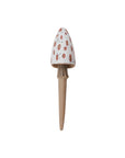 The White Spore Plant Stick by Accent Decor is a whimsical ceramic plant accessory with a beige stem and a white cap featuring red spots, designed to resemble a toadstool, shown against a plain white background.