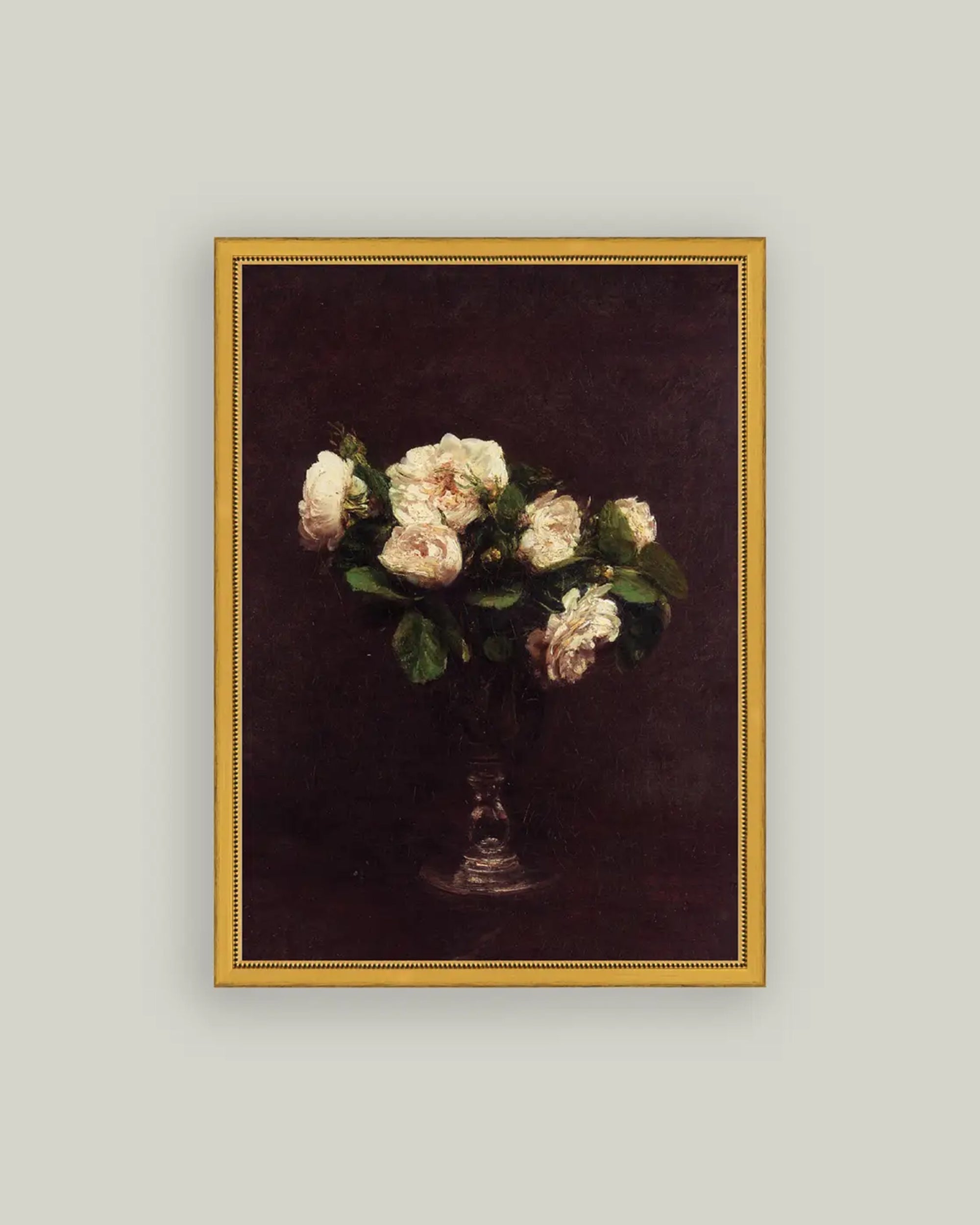 The Roses Blanches Art by Petal Lane Home is a framed art print featuring white roses in a glass vase, set in a thin gold frame with a simple patterned edge—an elegant addition to any décor.