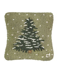 The Faire Christmas Flurries Frosted Tree Pillow is a square green hand-hooked wool pillow with a textured surface, showcasing a snow-covered Christmas tree and white dots for falling snow—ideal for festive holiday decor.