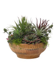 The Succulent Wood Bowl by Natural Decorations Inc. features maintenance-free green and purple succulents and moss, artfully arranged in a wood bowl for a lush, decorative display.