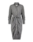 The Wrap Front Dress by THE SHIRT is a black and white gingham long sleeve shirt dress with a collar, front pocket, and waist tie, creating a gathered, draped effect on the midi skirt.