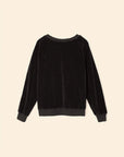 The Hopper Sweatshirt by Xirena is a black, long-sleeve velvet pullover with a crew neck and ribbed cotton-blend cuffs, neckline, and hem. Shown laid flat on a light beige background.