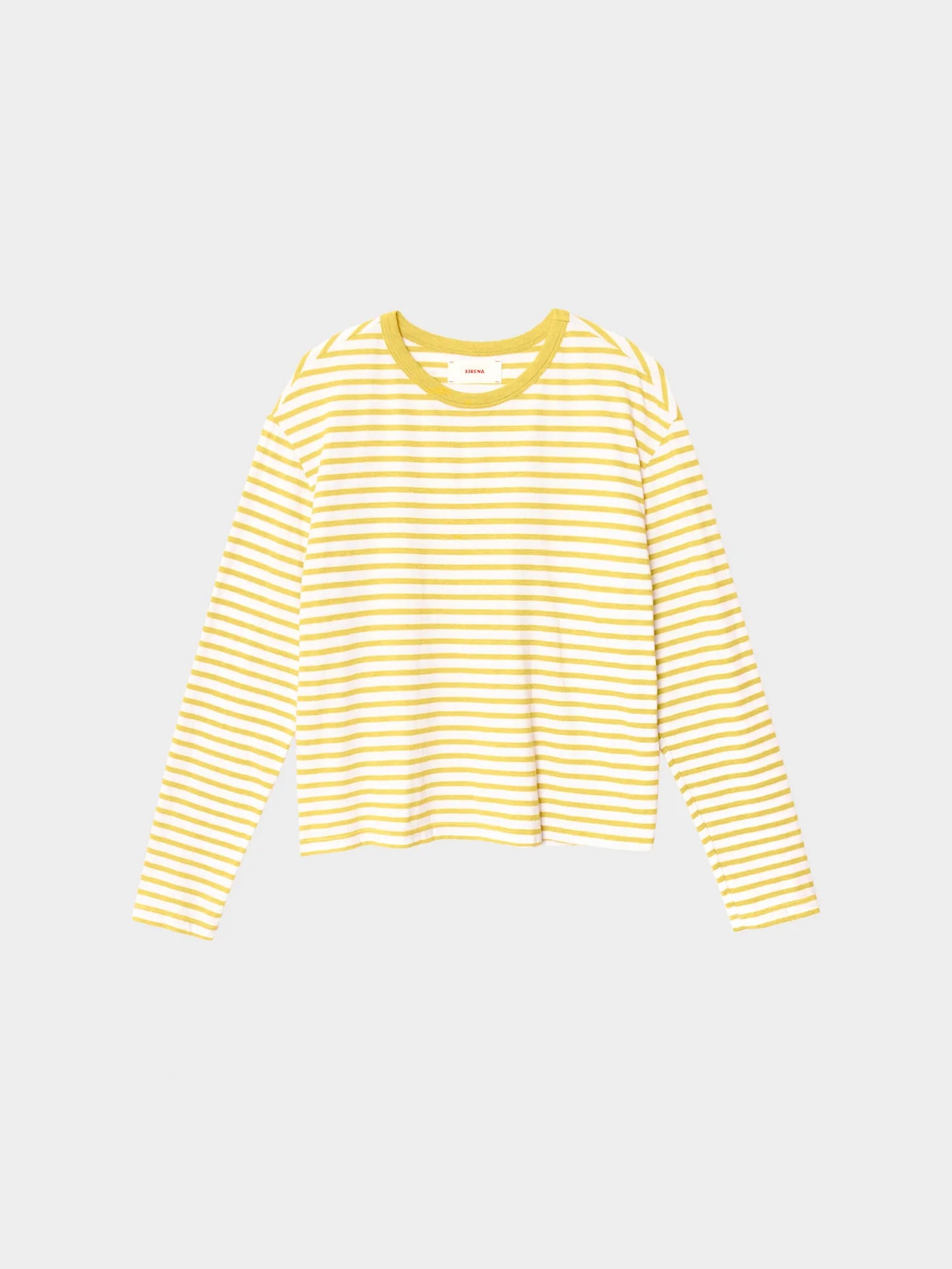 The Xirena Terrance Top is a long sleeve tee made in Los Angeles, featuring yellow and white stripes on soft cotton jersey with a yellow collar, shown laid flat on a plain white background.