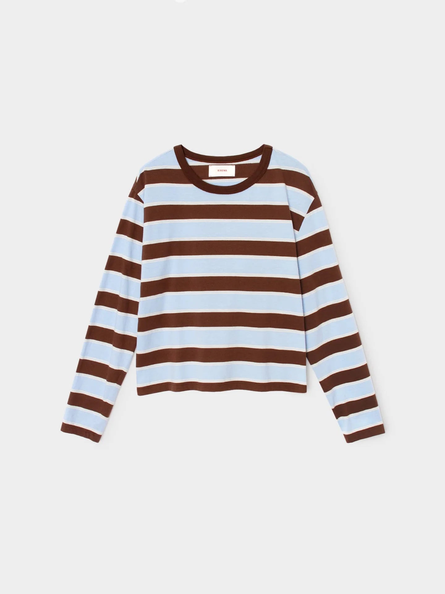 Long sleeve Xirena Terrance Tee in blue and brown stripes, boxy fit, vintage style, laid flat on white background.