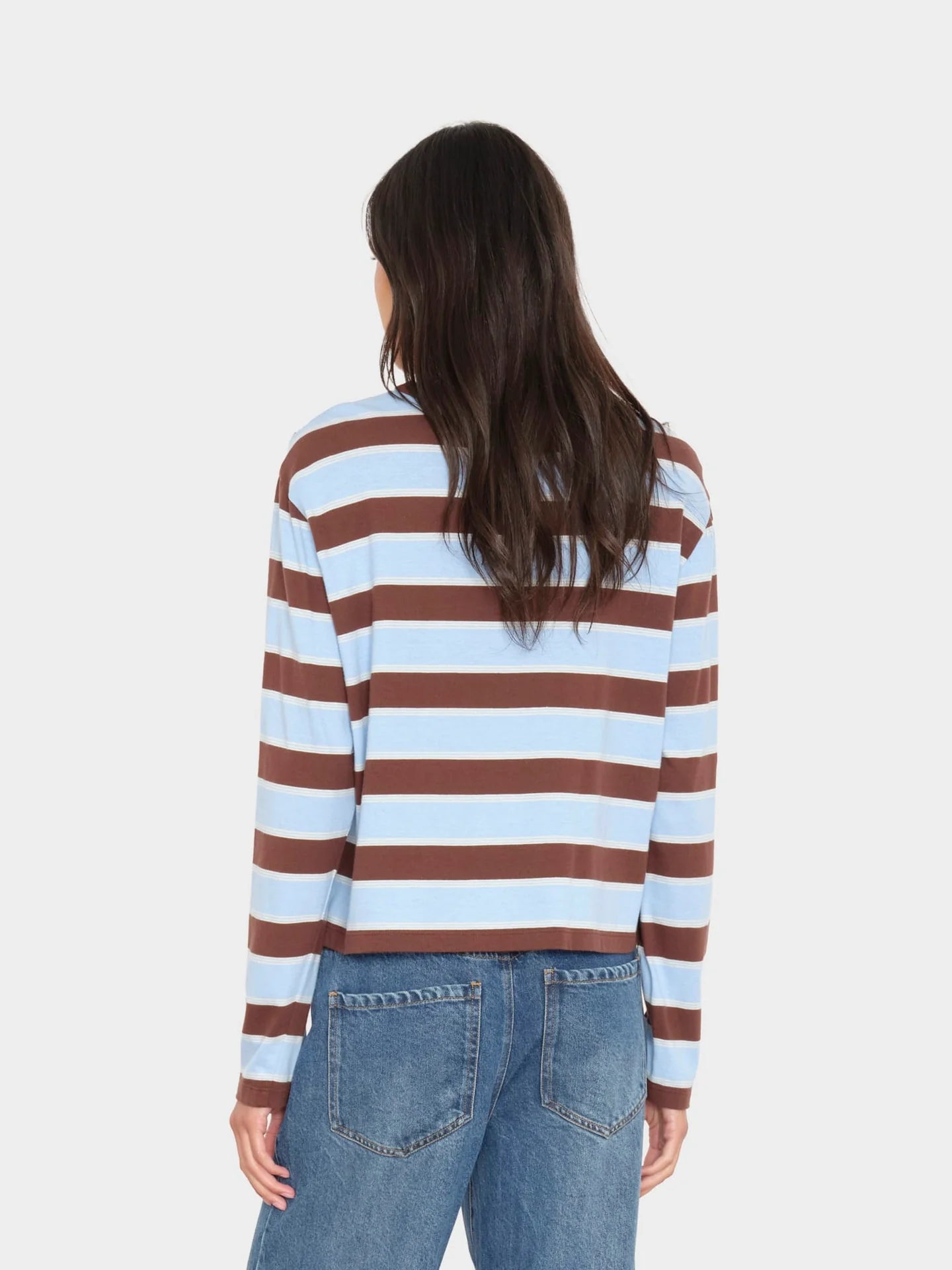 Striped Xirena Terrance Tee in a vintage-inspired boxy fit, styled casually with blue jeans for a relaxed look.