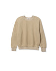 The Ziggy Reverse LS Sweatshirt by Perfectwhitetee is a beige, shrunken-fit crewneck with bracelet-length sleeves and ribbed cuffs, hem, and neckline, crafted from textured fleece-like fabric. Shown laid flat on a white background.