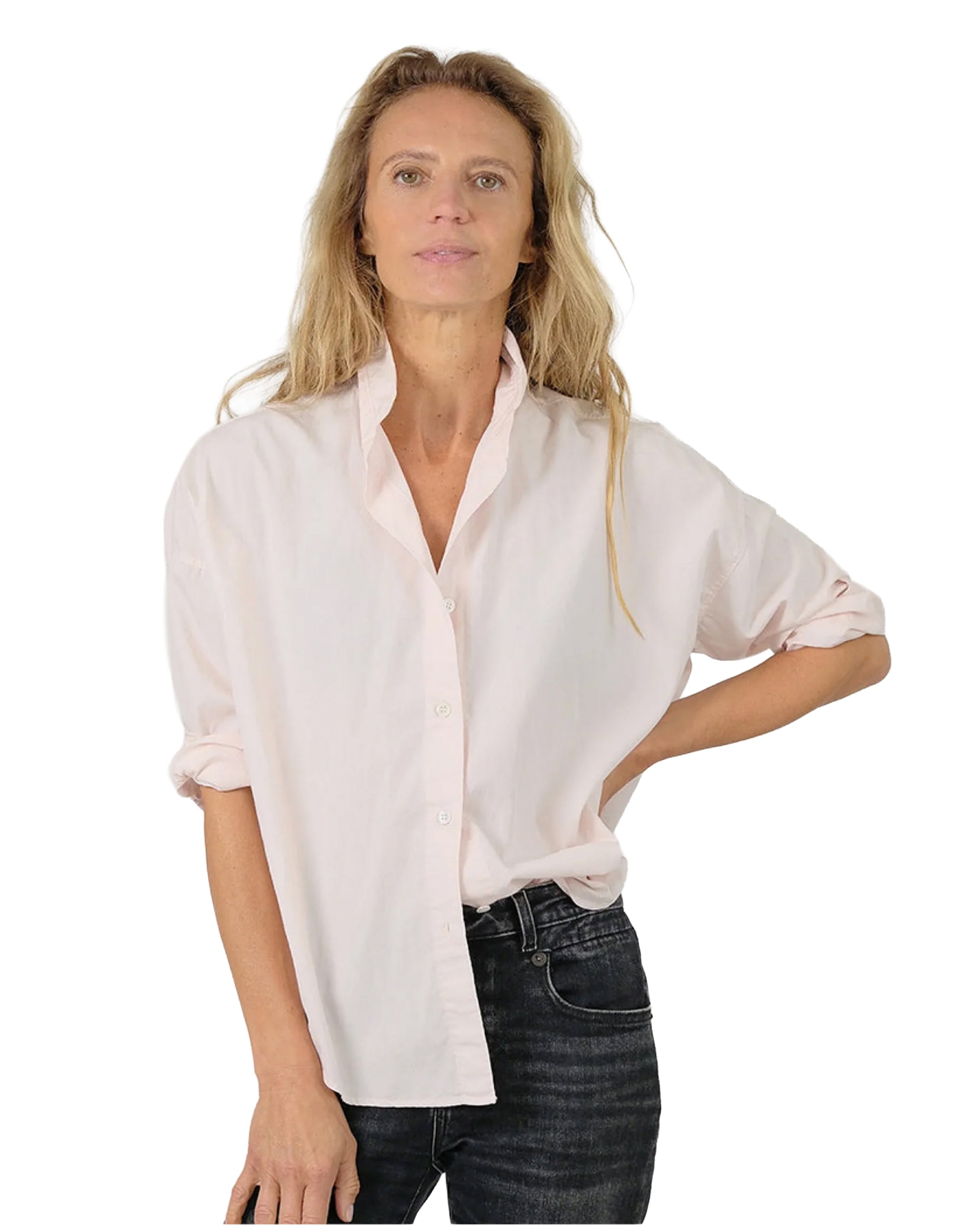 Vintage pink Zoe Shirt by Monday12 paired with black jeans, styled confidently against a bright white background.