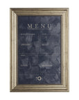 An elegant framed **Mercana Menu Art** with a vintage aesthetic on a textured blue background, featuring sections labeled "Hors d'Oeuvres," "Soup," "Appetizer," "Salad," "Main," *Dessert,* and *Mignardise.* Found in a Scottsdale Arizona b