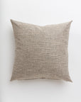 A simple Grasscloth Steel 24x24" throw pillow by Gabby, designed for a Scottsdale bungalow, lying flat against a white background. The texture of the fabric is prominently visible, highlighting its natural, coarse weave.