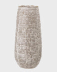 A tall, cylindrical stoneware vase from Bloomingville with a textured, basket-weave pattern in white and beige colors, perfect for a bungalow in Scottsdale, Arizona, isolated on a white background.