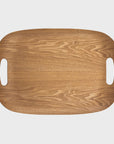 A Bloomingville Natural Oak Wood Serving Tray with a smooth finish and natural grain pattern, featuring two oval cut-out handles on its shorter sides, designed in Arizona style.