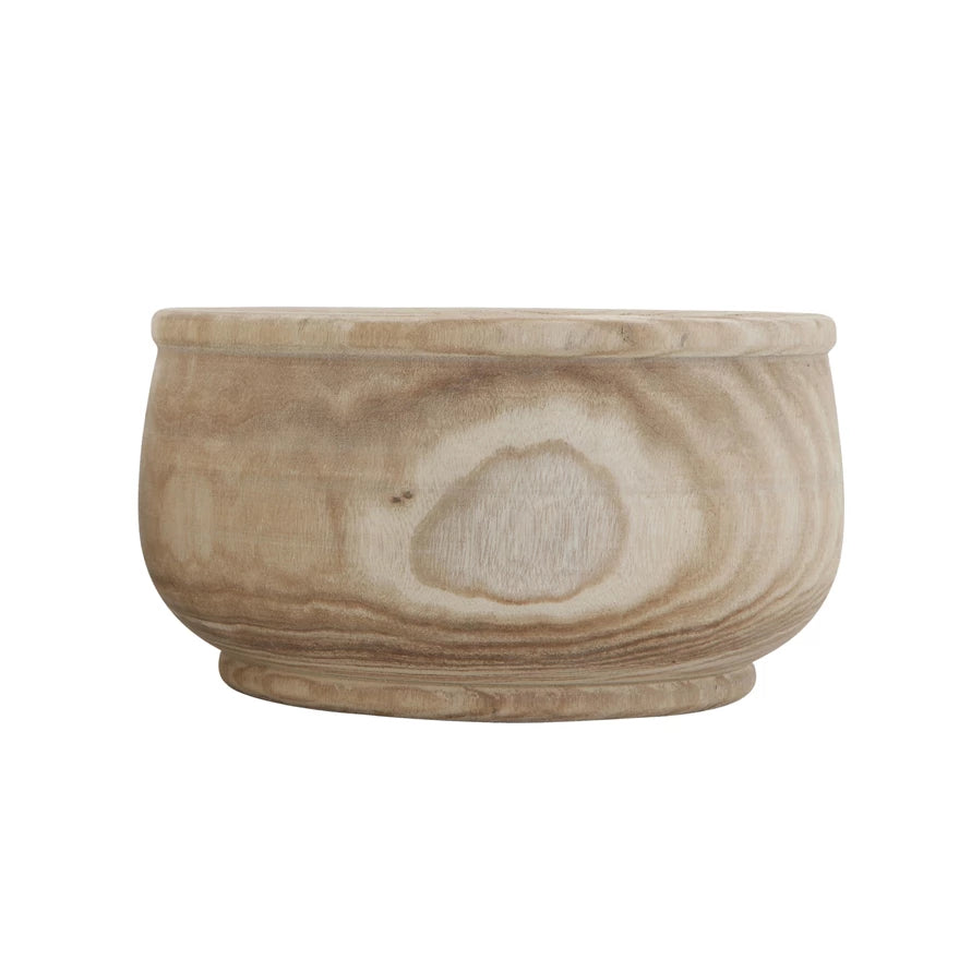 A small, round paulownia wood planter made of light-colored wood with visible grain patterns. The Wood Planter by Creative Co-op has a simple design with a slightly rounded base and a smooth finish, making it an ideal room decor piece.
