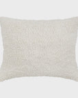 The Murphy Big Pillow 28x36 by POM POM is a square, off-white throw pillow featuring a plush, shaggy fabric that resembles fleece or faux shearling. This cozy and soft pillow with its bouclé texture is perfect for adding comfort and warmth to any living space.