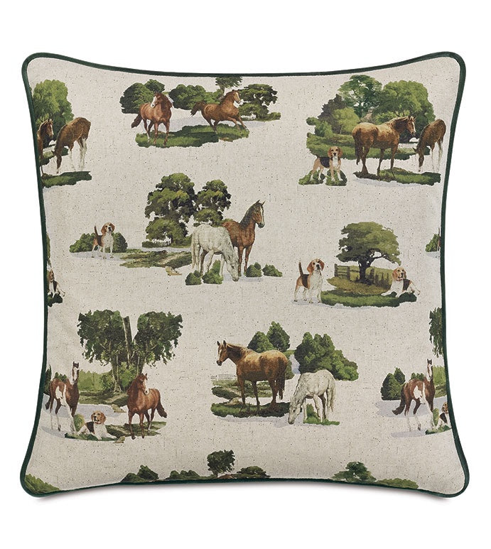 The Colburn Country 22x22" pillow from Eastern Accents showcases a charming countryside scene with horses and dogs nestled among trees and grass on a light backdrop, beautifully accented by a dark green border. It features an invisible zipper closure for a sleek finish.