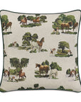 The Colburn Country 22x22" pillow from Eastern Accents showcases a charming countryside scene with horses and dogs nestled among trees and grass on a light backdrop, beautifully accented by a dark green border. It features an invisible zipper closure for a sleek finish.